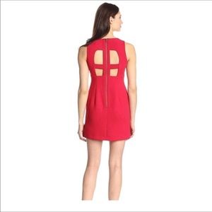 Great structured red dress with cut outs